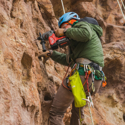 Re-bolting climbing routes at Smith Rock State Park near Bend, OR